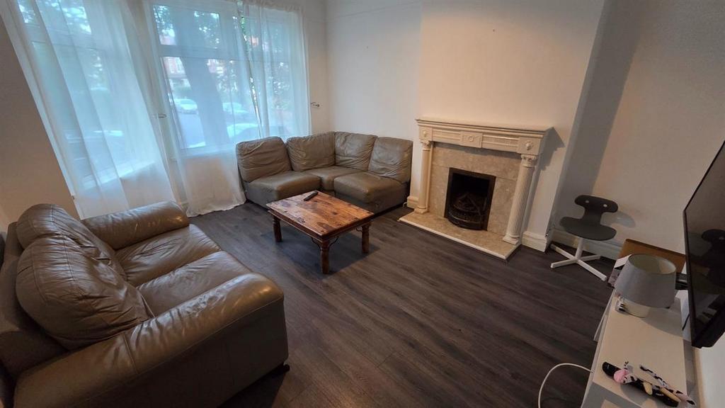 Bright, well-presented living room with large f...