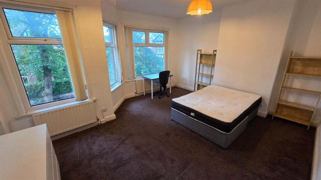Bright, well-proportioned bedroom with a double...