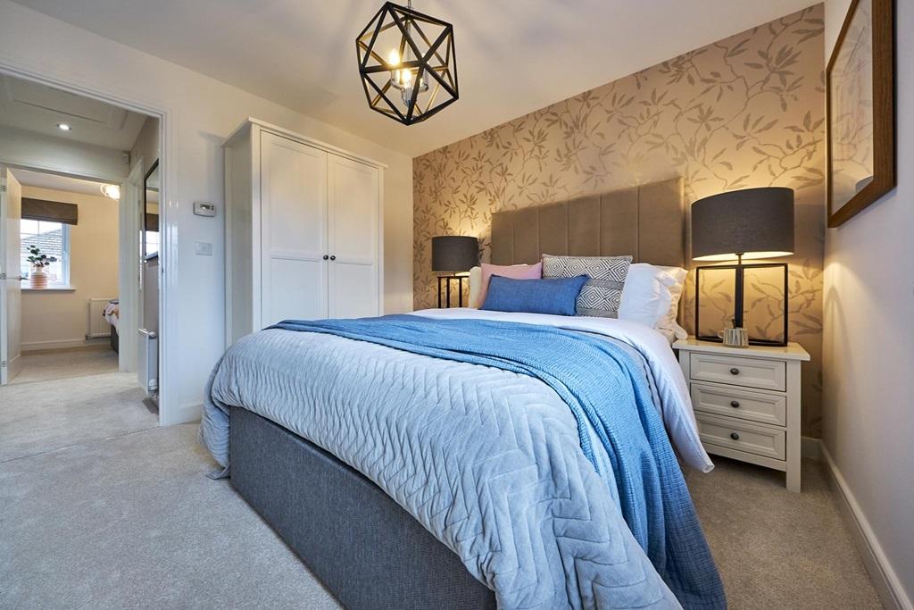 Relax after a long day in the main bedroom