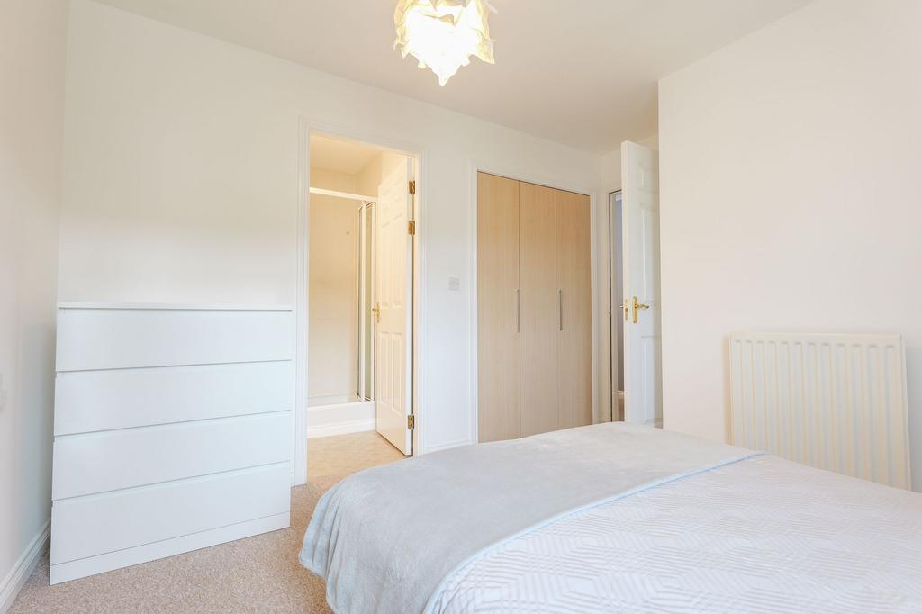 Double bedroom features private ensuite shower...