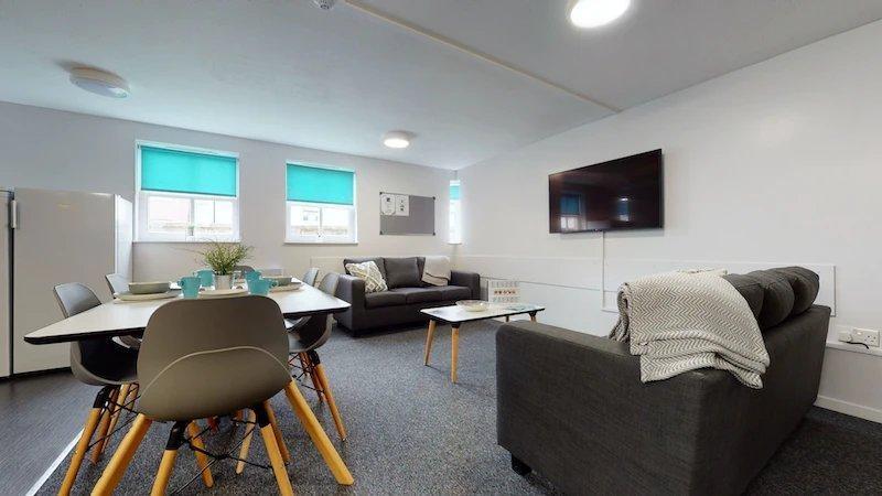 A spacious, modern living room featuring ample ...