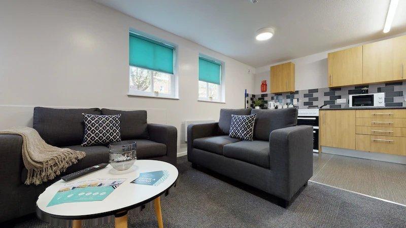 A modern and inviting living room featuring two...