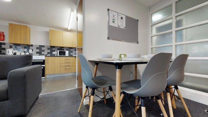 A bright and inviting communal lounge with mode...