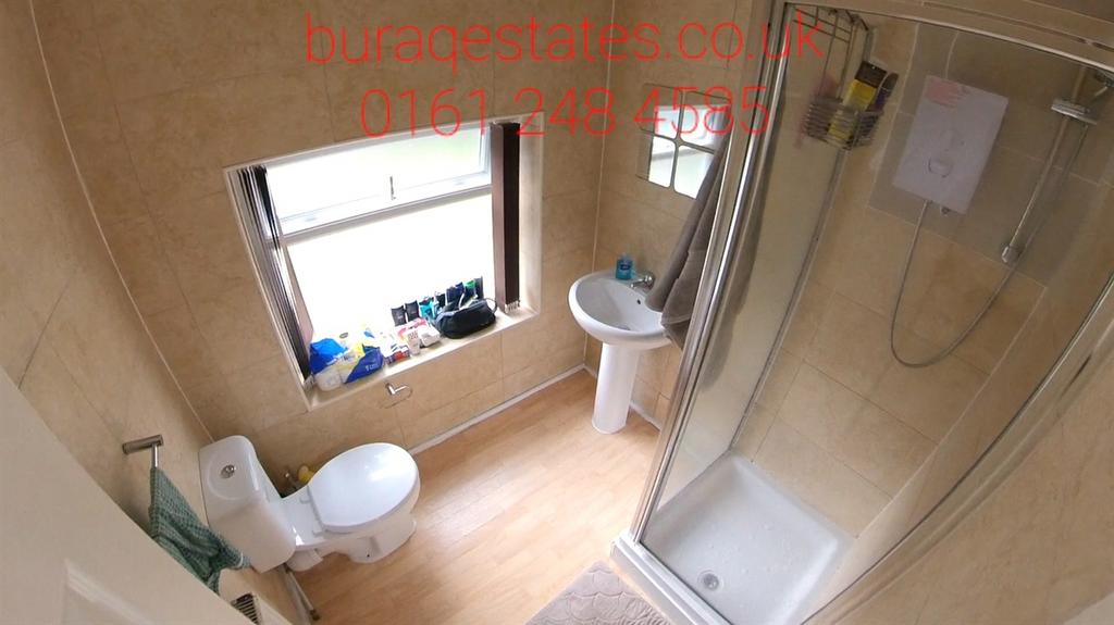 Bright, modern bathroom with a walk-in shower, ...