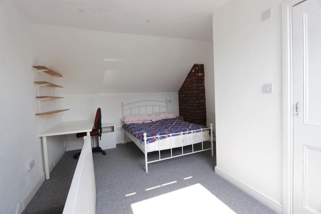 7. attic bedroom .jpg