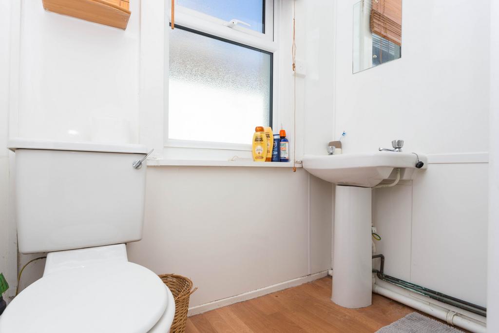 A clean and well-maintained bathroom with a sin...