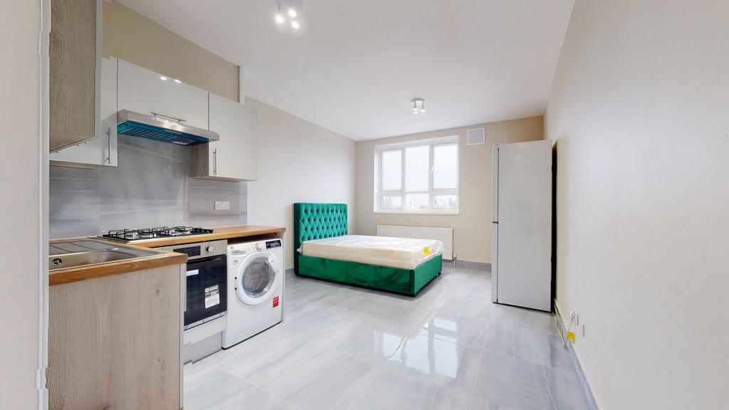 Bright and modern kitchen featuring integrated ...