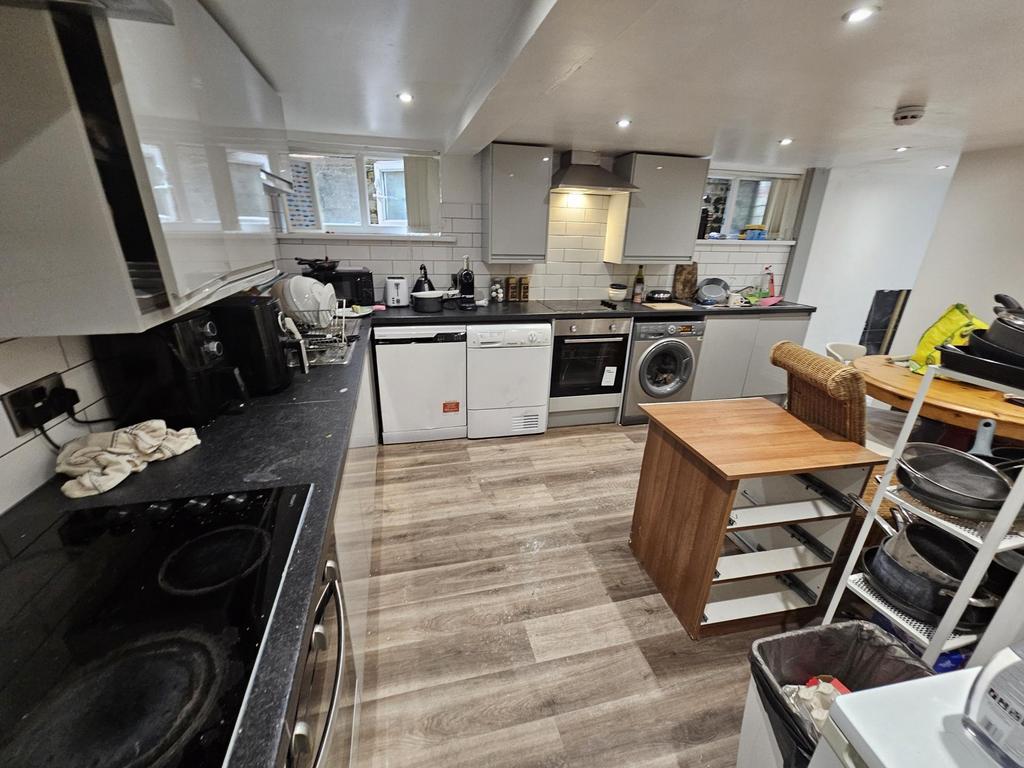 A modern, well-maintained kitchen featuring a s...