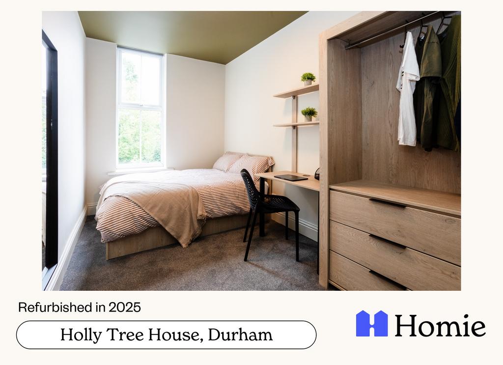 Bright, cozy bedroom featuring a double bed, am...