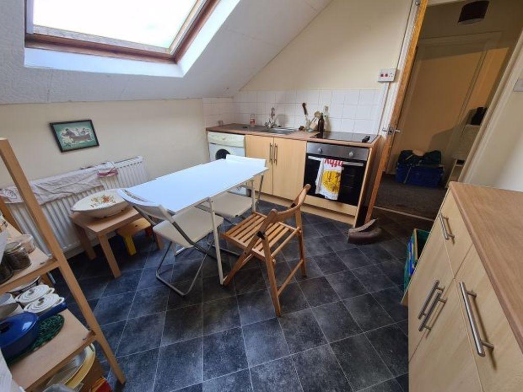 Bright and functional kitchen featuring modern ...