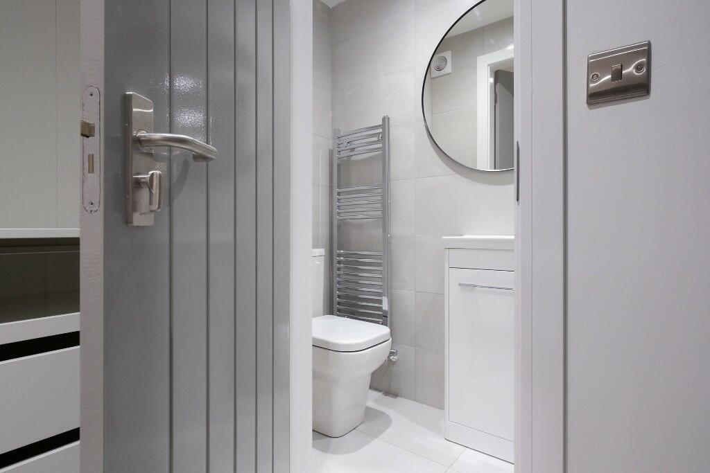 Bright, modern bathroom with a contemporary van...