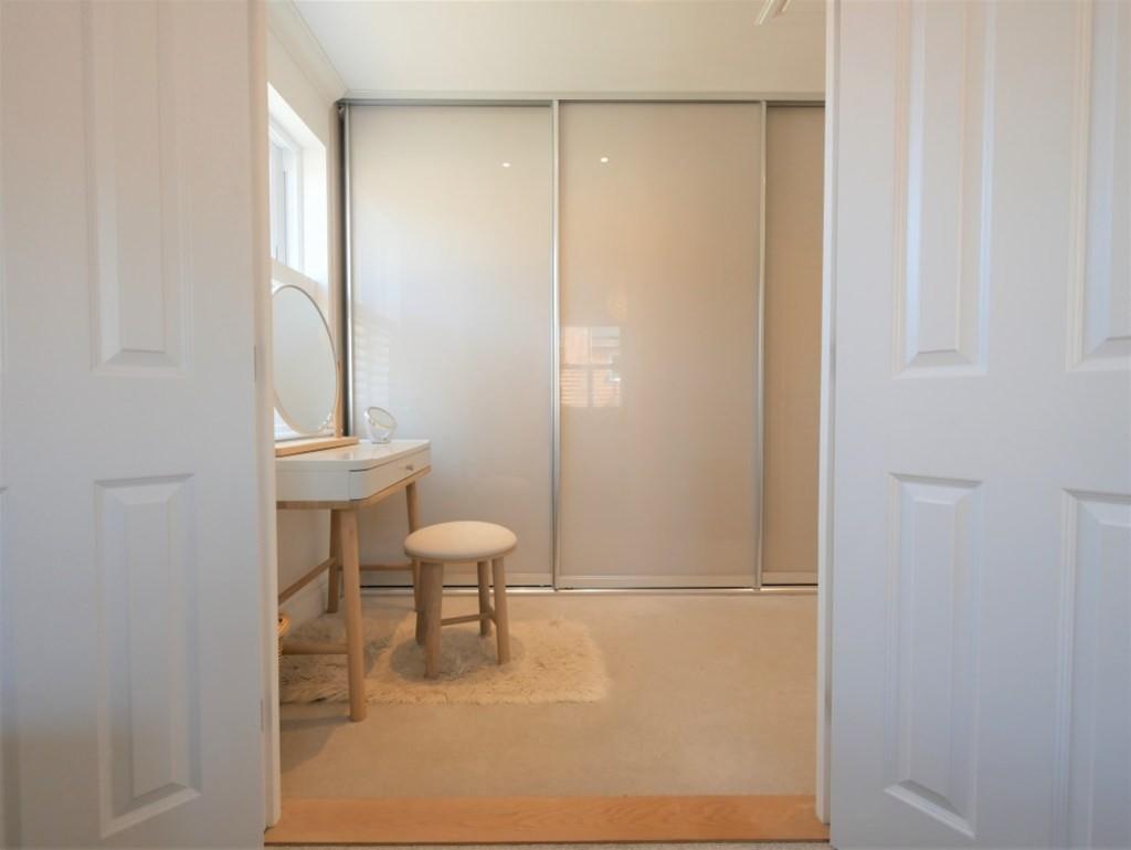 Principal bedroom through to dressing or bedroom4