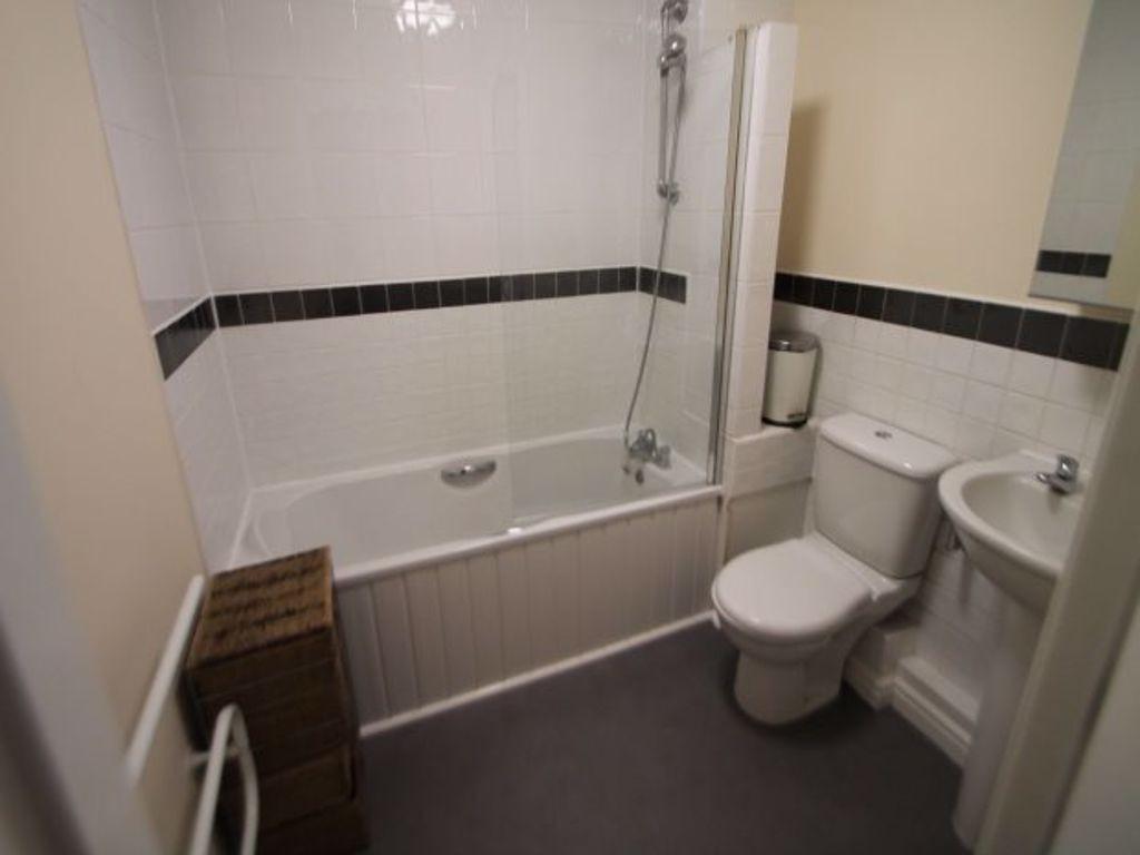 Bright, tidy bathroom with a shower-over-bath, ...