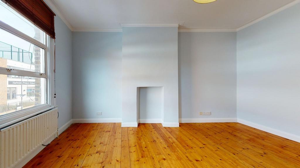 Bright and spacious bedroom featuring polished ...