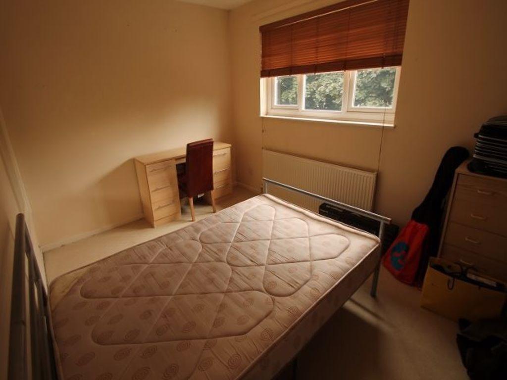 Simple furnished bedroom with a double mattress...