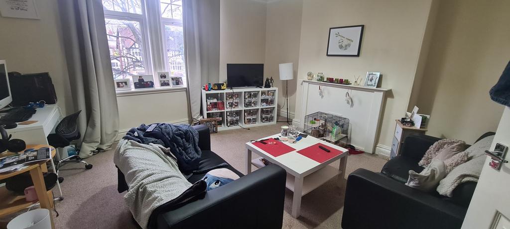 Cosy communal living area with seating around a...