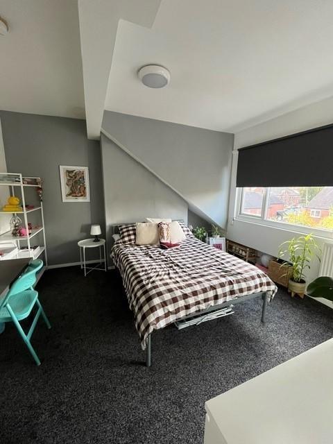 Bright and inviting master bedroom featuring a ...