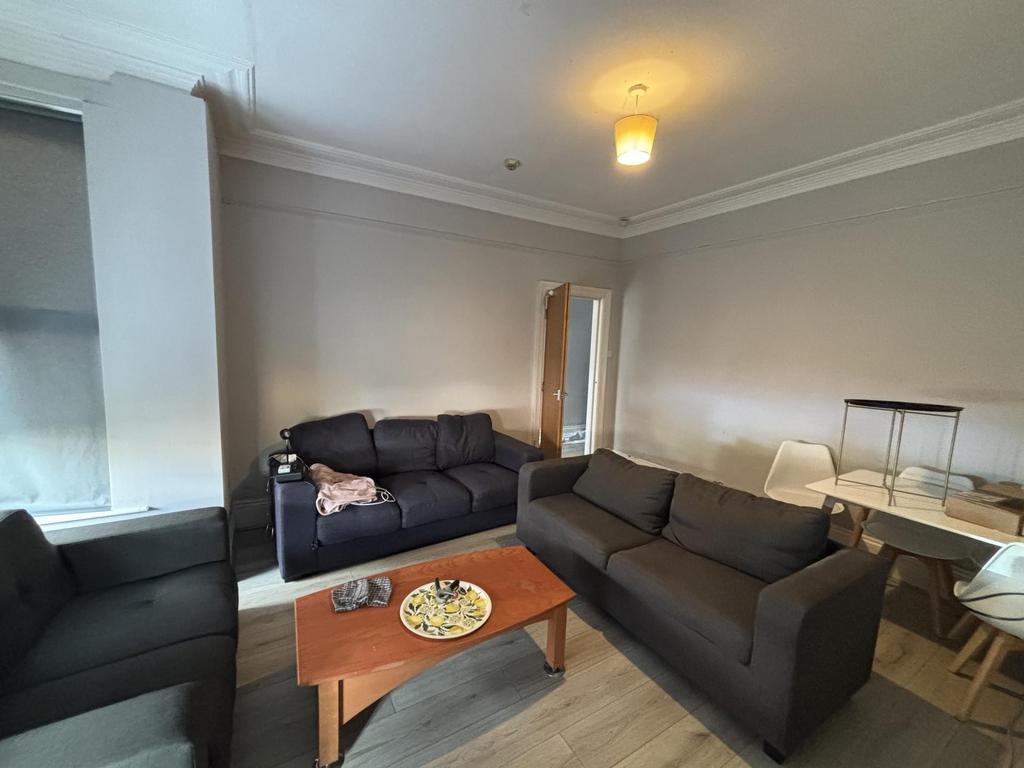 Spacious and modern living room with ample seat...