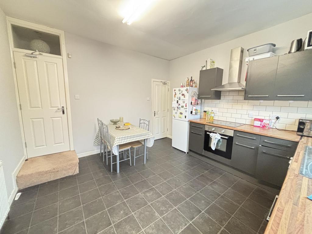 A bright and modern kitchen with ample counter ...