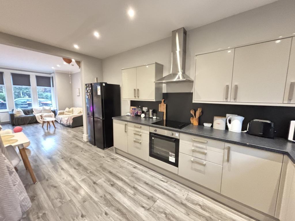 Modern and bright living room with ample natura...