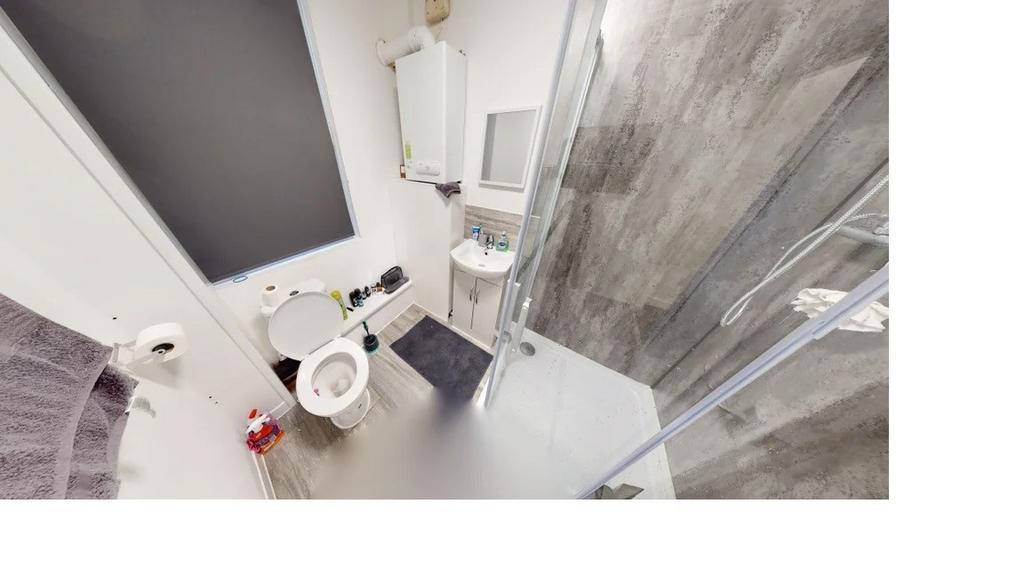 Modern bathroom with a clean, minimalist design...