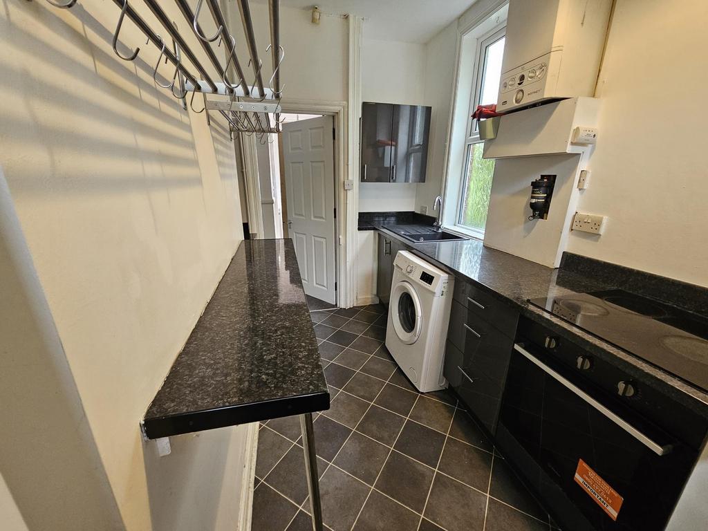 A modern, well-maintained kitchen featuring a w...