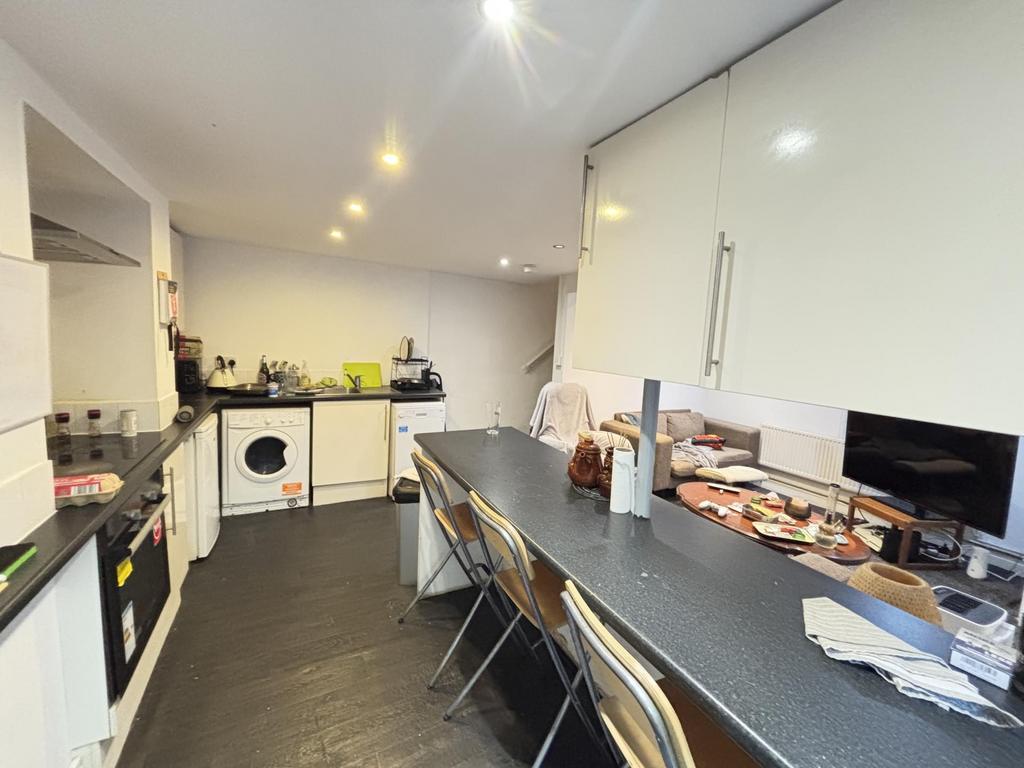 Modern and well-organized kitchen equipped with...