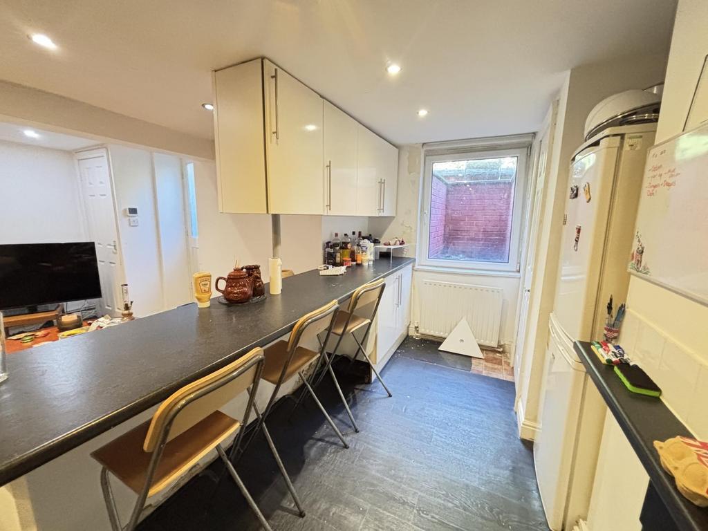 A bright and well-maintained kitchen featuring ...