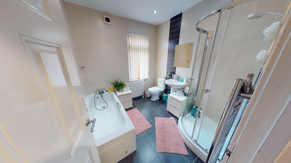 Bright and well-maintained bathroom with a spac...