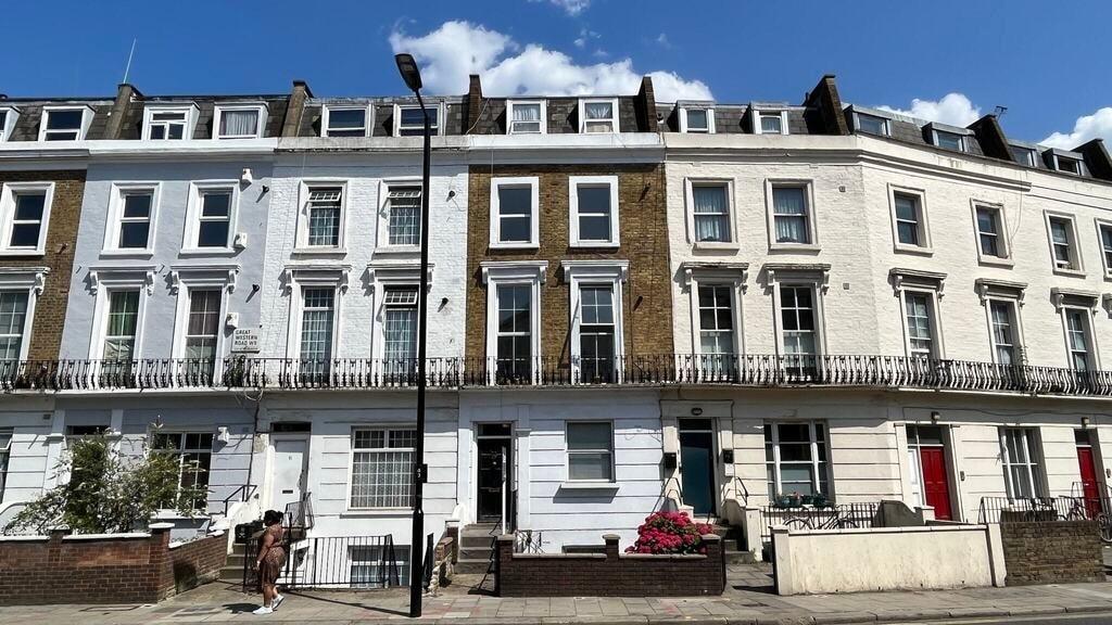 A charming row of classic terraced houses with ...