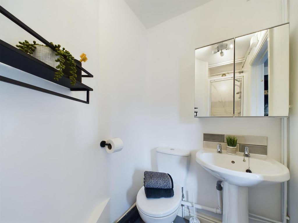 A modern, well-maintained bathroom featuring a ...