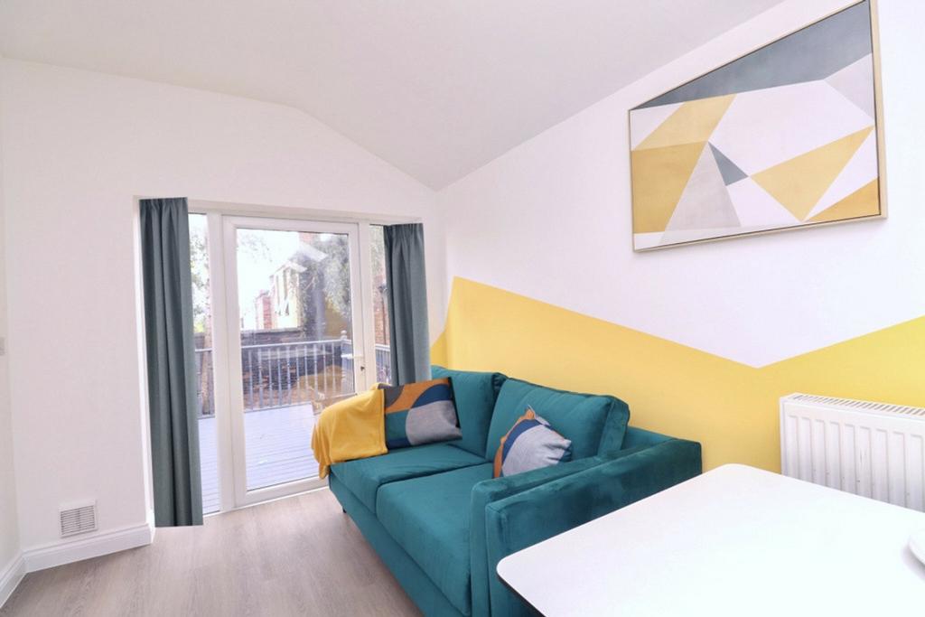 A bright and inviting living room featuring mod...