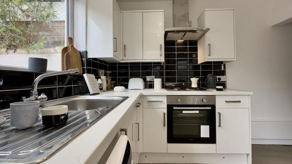 A bright and modern kitchenette, perfect for st...