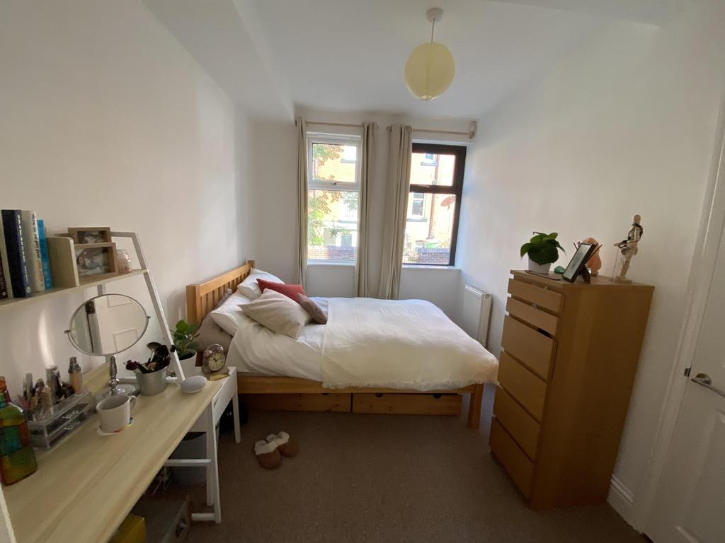 Bright, neatly presented bedroom with a double ...