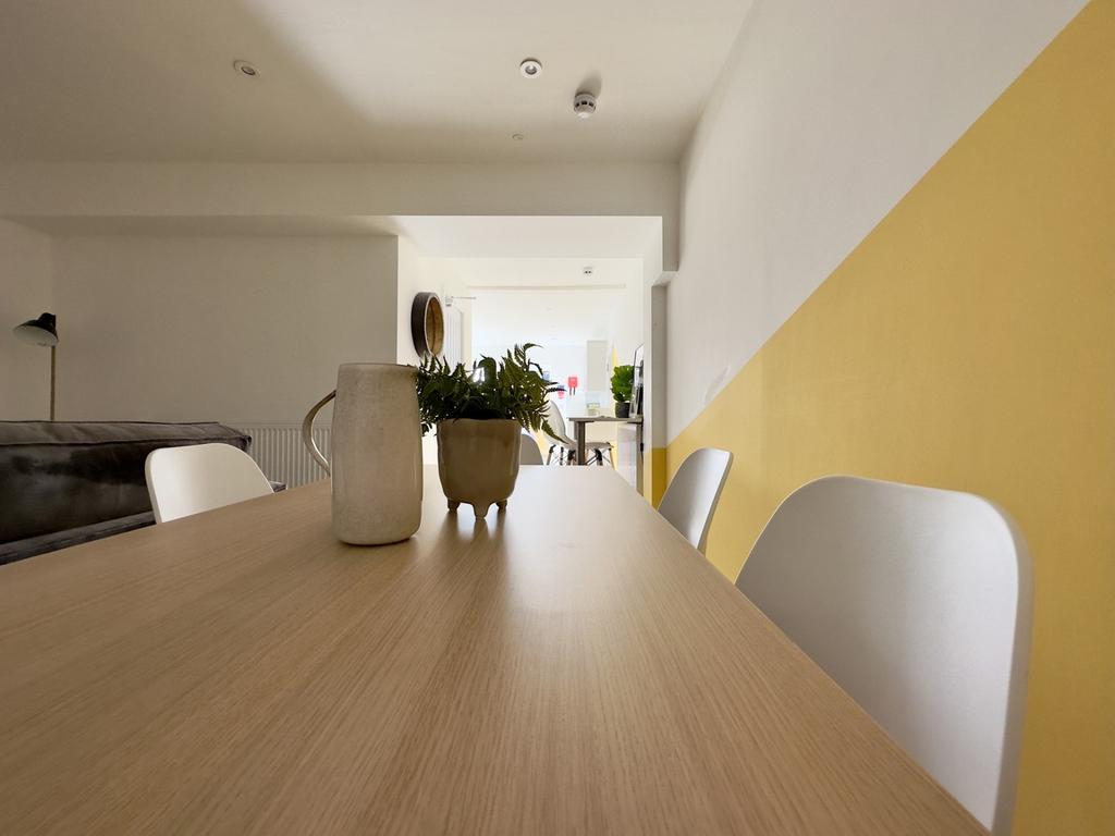 A bright and inviting living room with modern d...