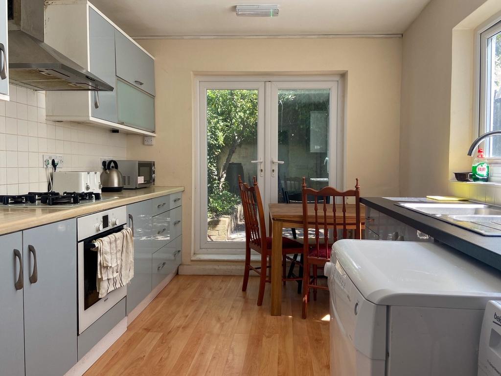 Bright and well-maintained kitchen with modern ...