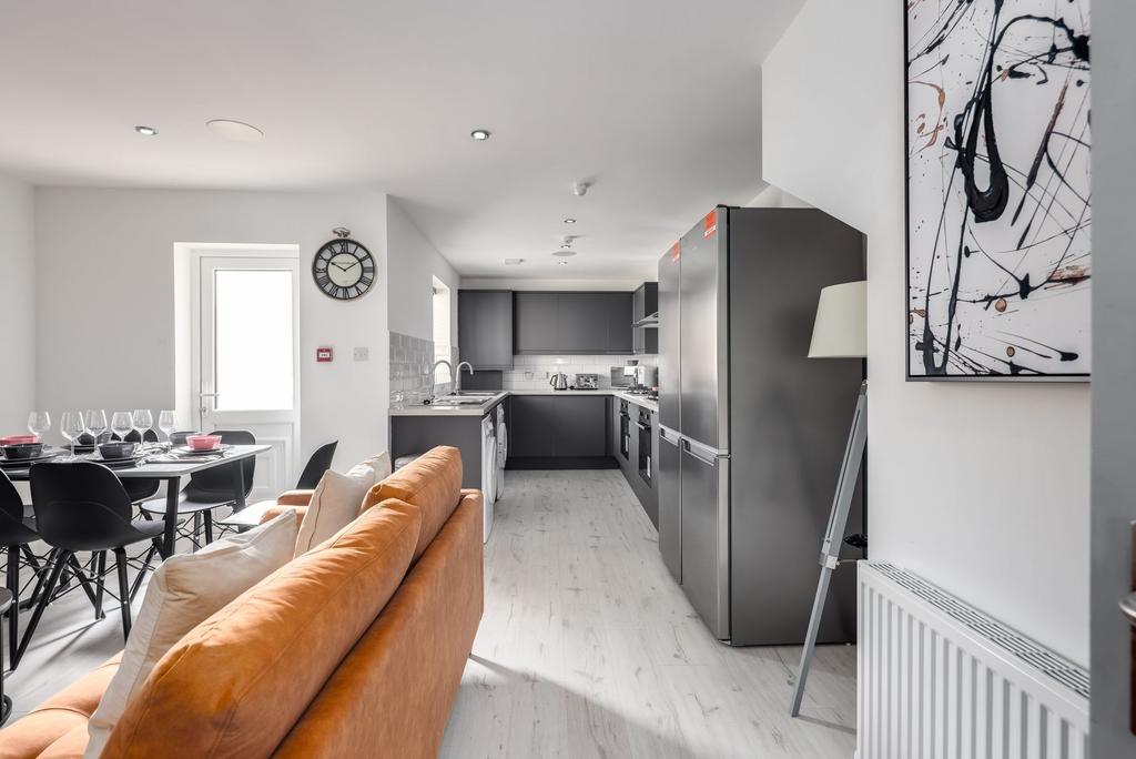 Bright and airy living space featuring a comfor...