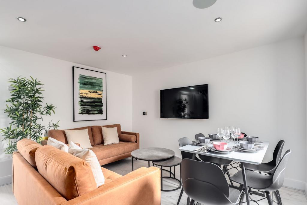 A modern and inviting living room featuring sty...