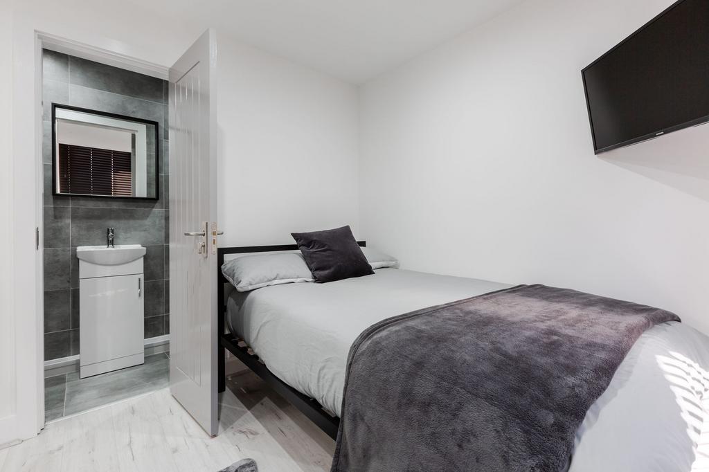 A neatly presented double bedroom featuring a c...