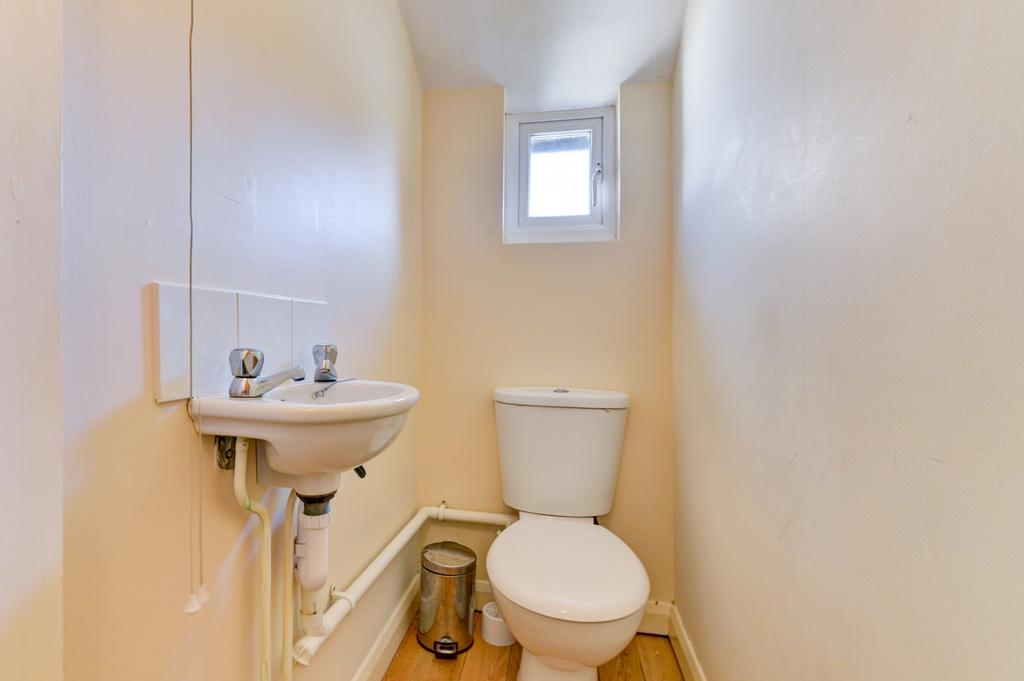 A well-maintained bathroom featuring a standard...