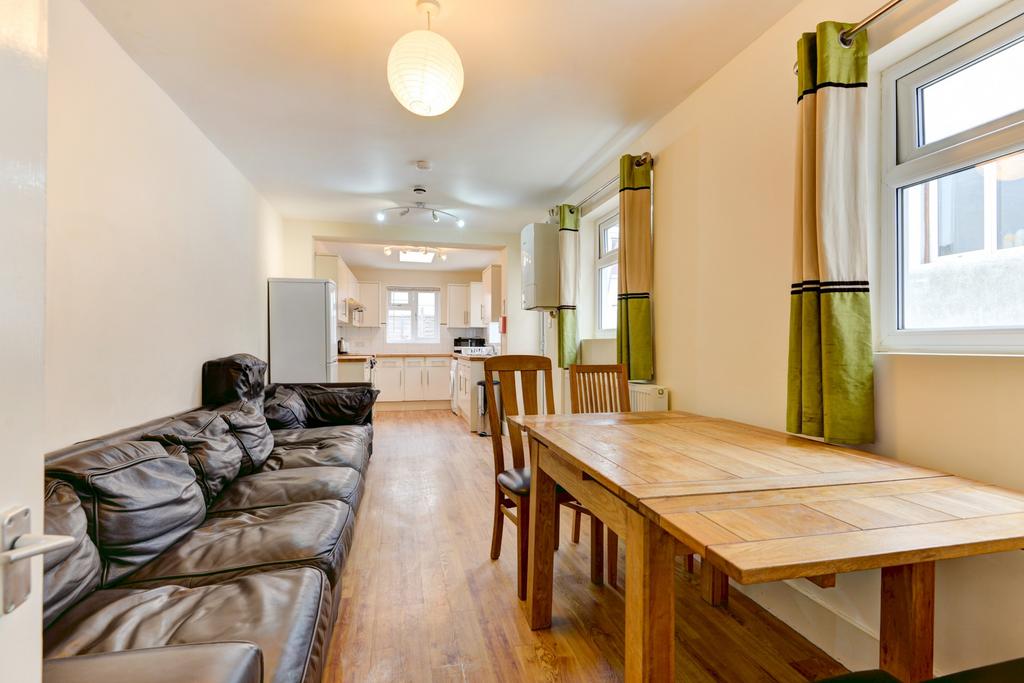 Bright and welcoming living room featuring a co...