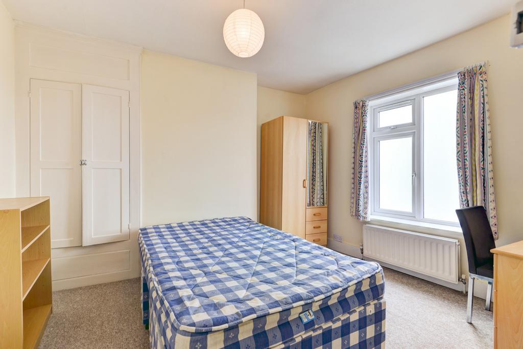 A bright and well-maintained double bedroom fea...