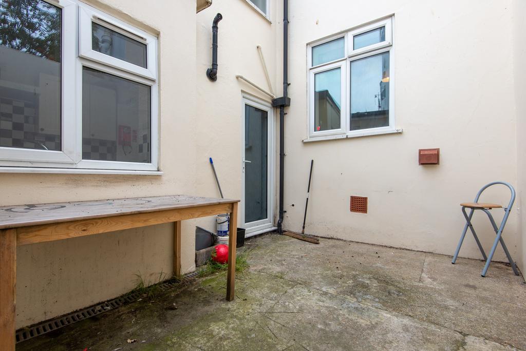 A straightforward exterior shot of the front of...