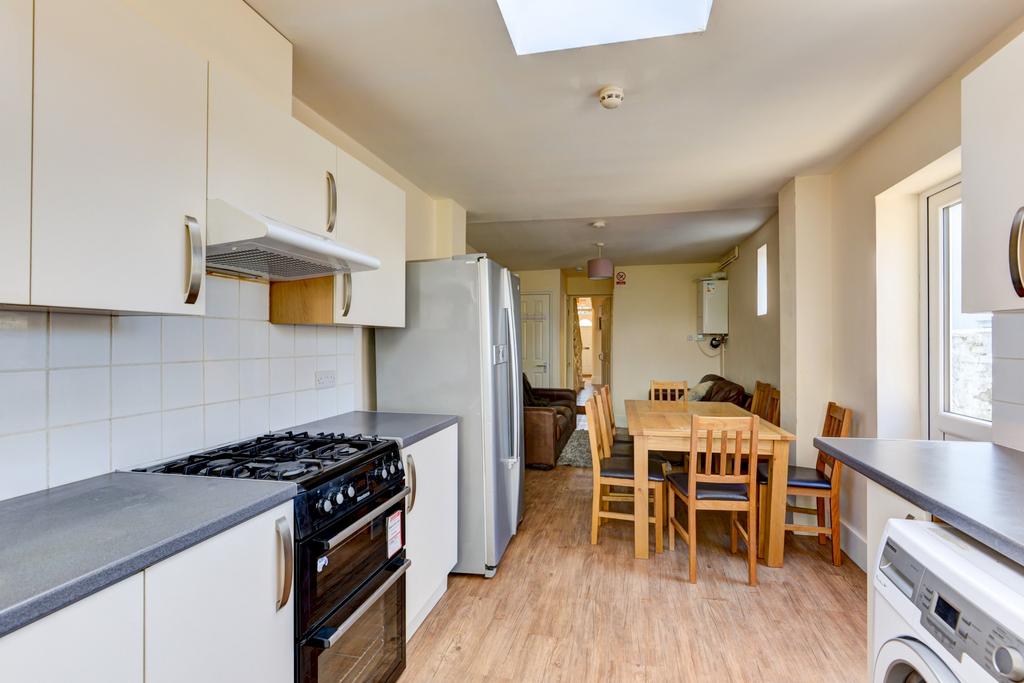 Bright and functional kitchen with ample natura...