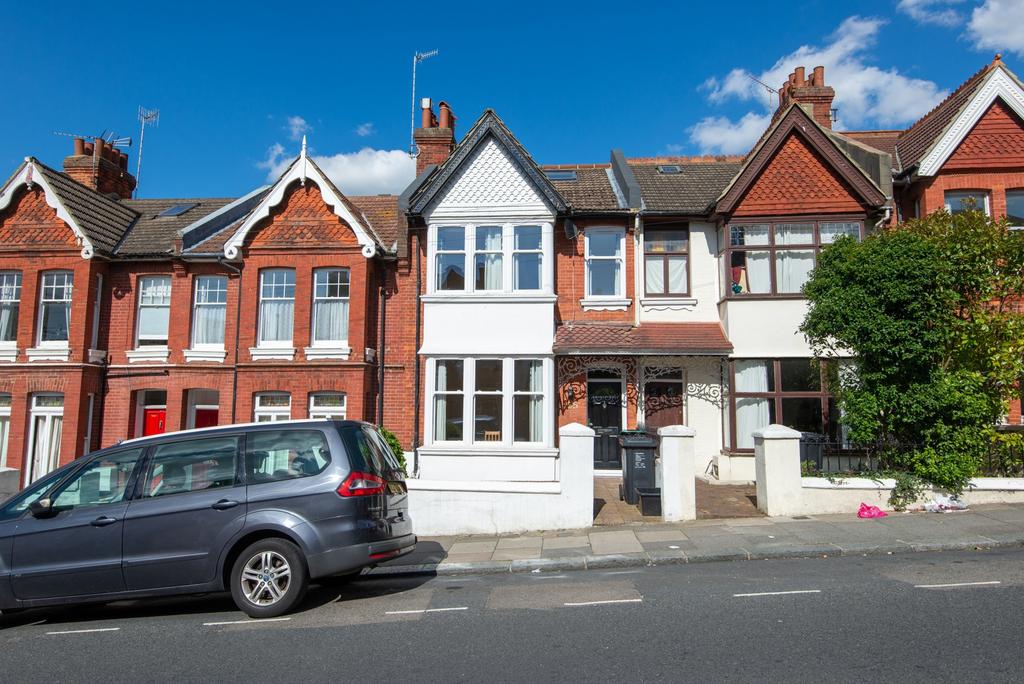 A clear photo of the front exterior of a terrac...