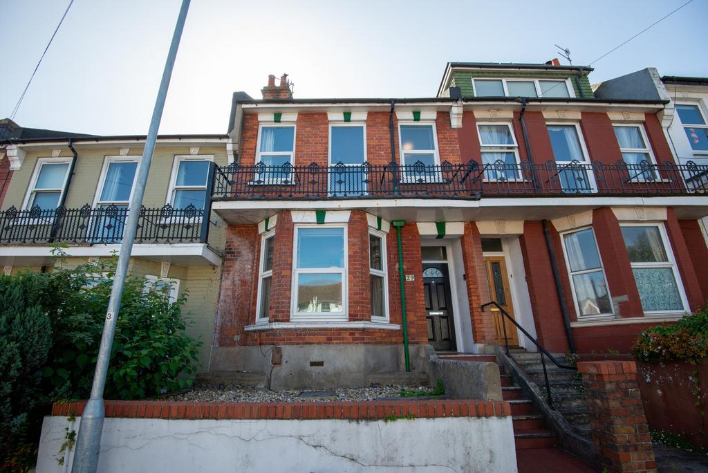 A charming view of the front facade of a tradit...