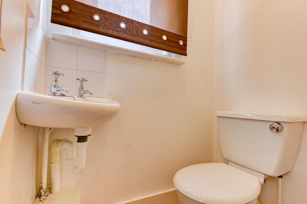 A clean and well-maintained bathroom featuring ...