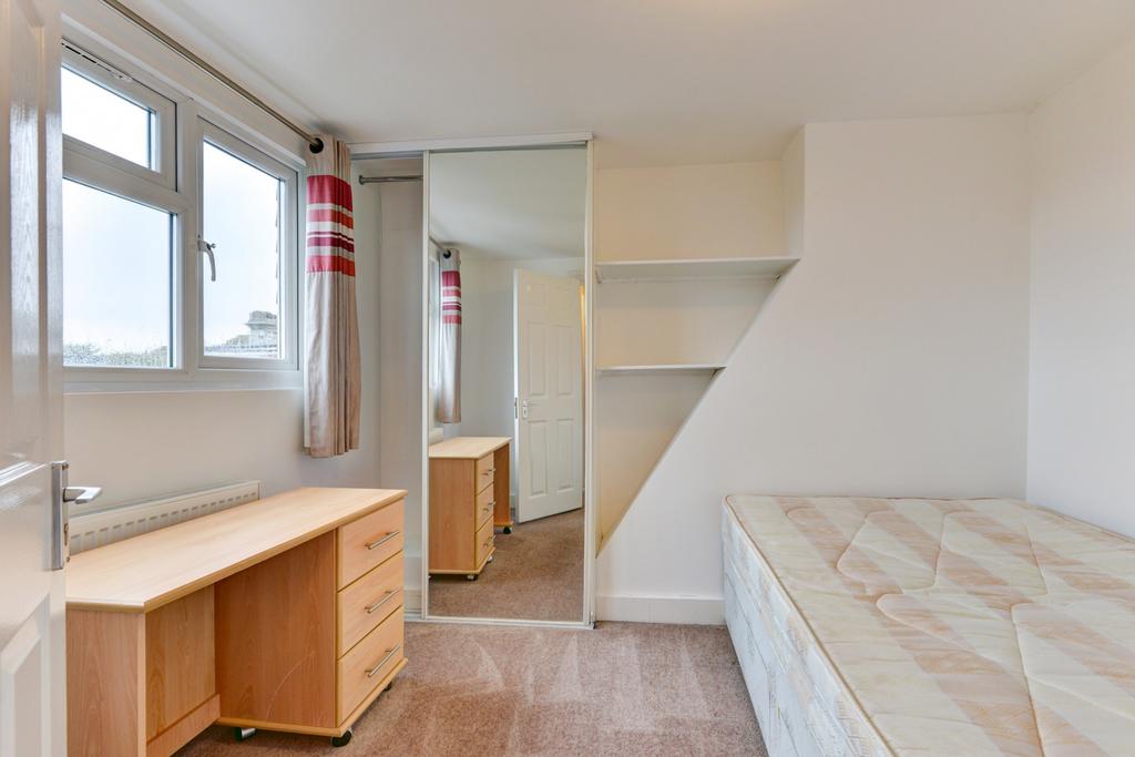 Bright and well-maintained bedroom featuring a ...