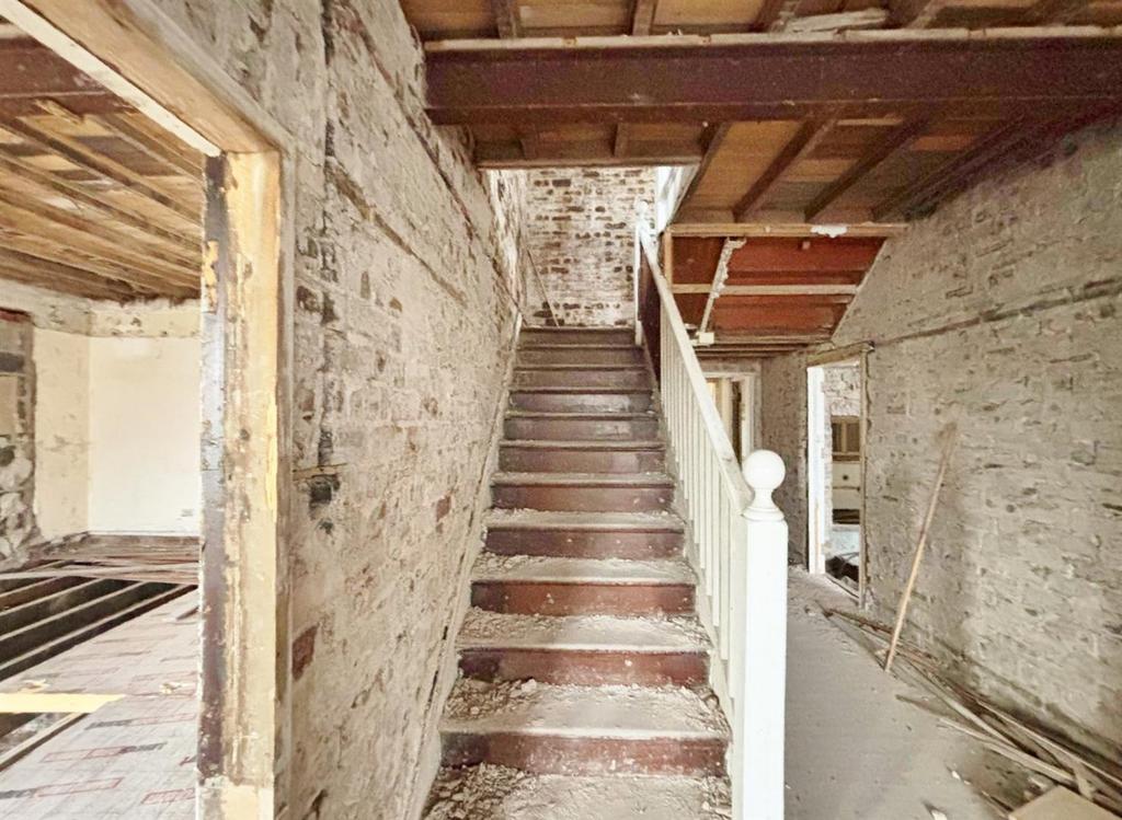 Entrance hallway and stairs to the first floor