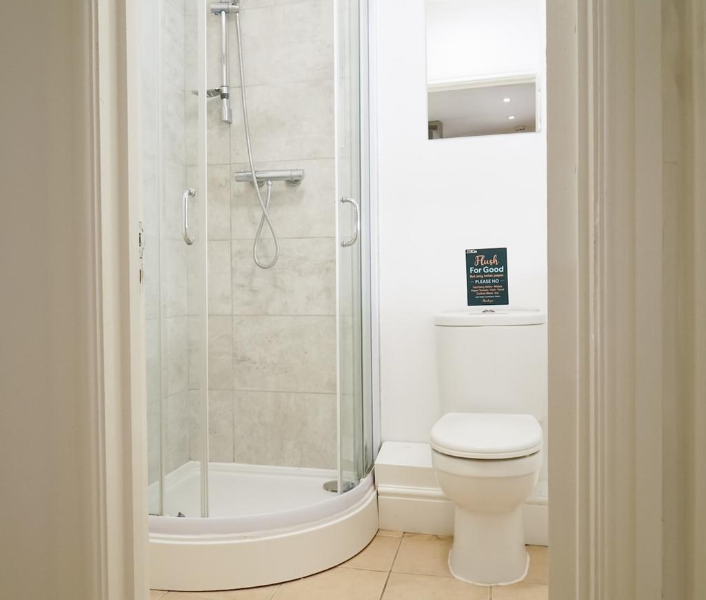 A modern and clean bathroom featuring a stylish...